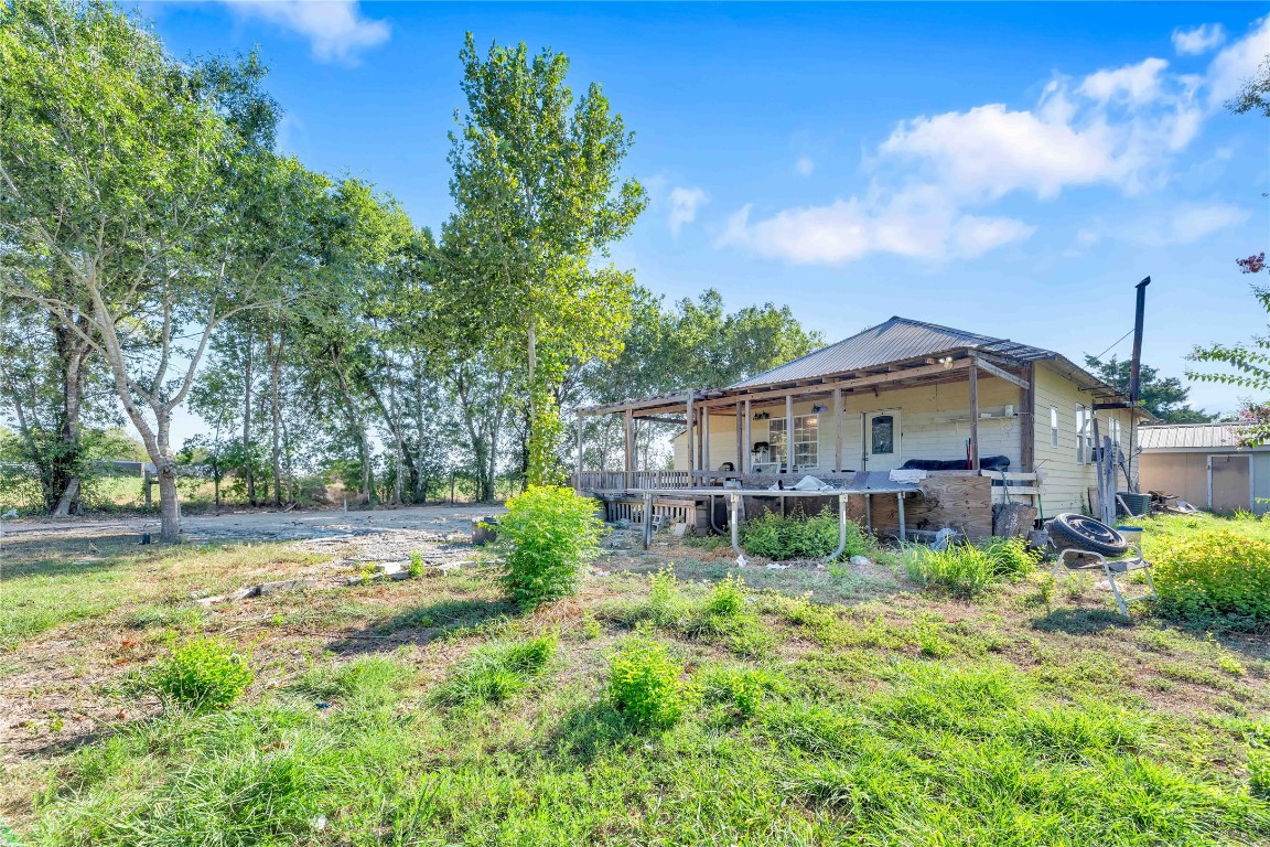 20235 Engelmann Lane Manor, TX 78653 - Photo 19 of 34 a house view with a garden space