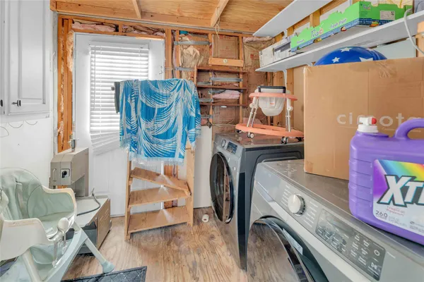 a bathroom with a sink toilet vanity and bathtub