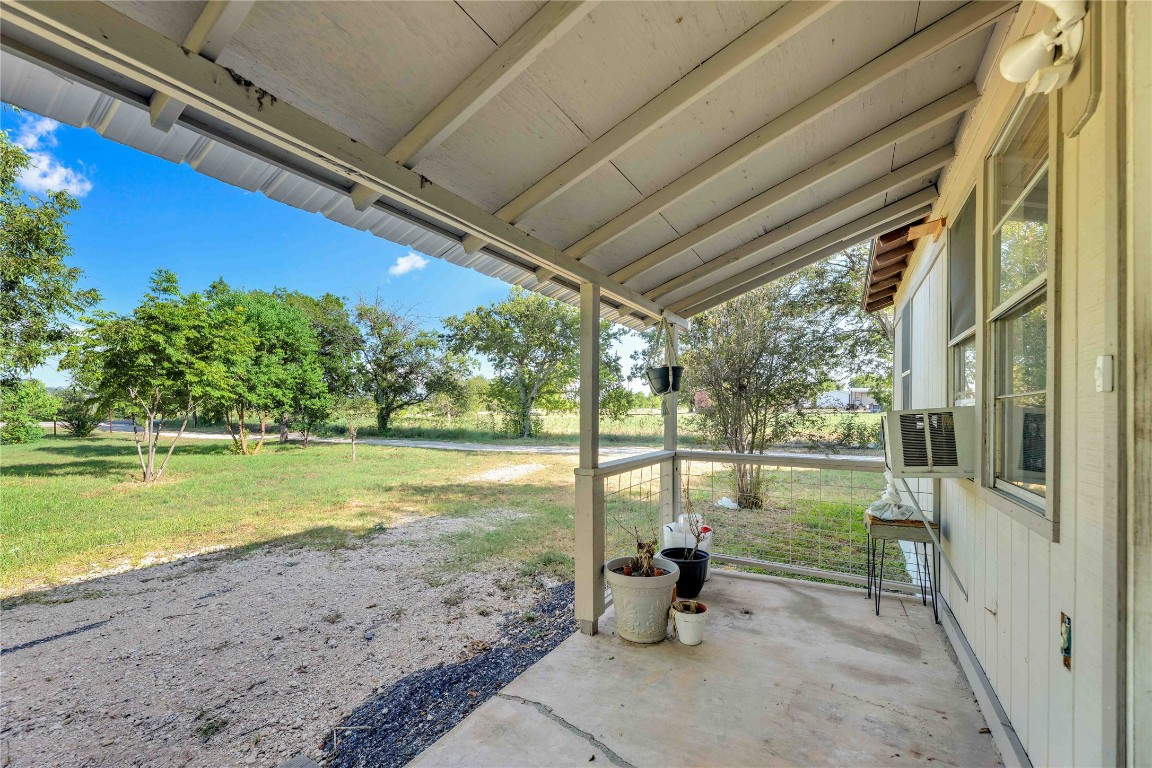 20235 Engelmann Lane Manor, TX 78653 - Photo 4 of 34 a view of a outdoor space with a lake view