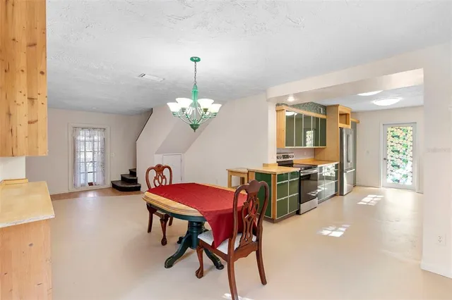 a view of a dining room with furniture