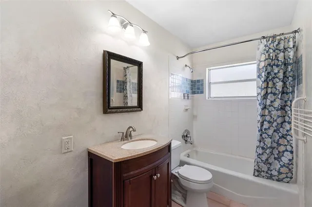 a view of a hallway with washer and dryer