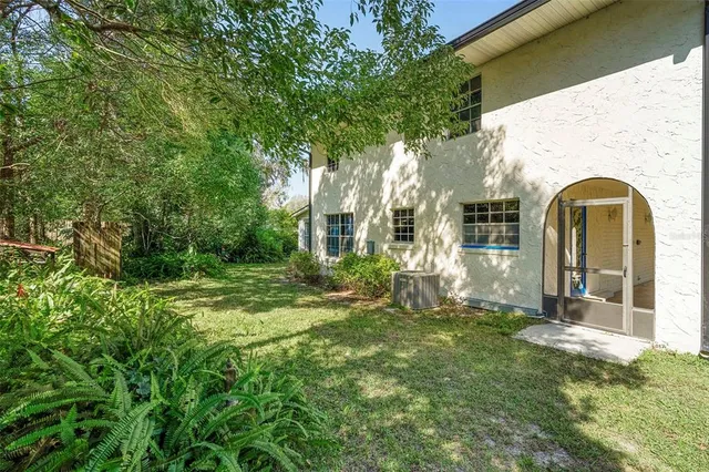 a view of backyard with green space