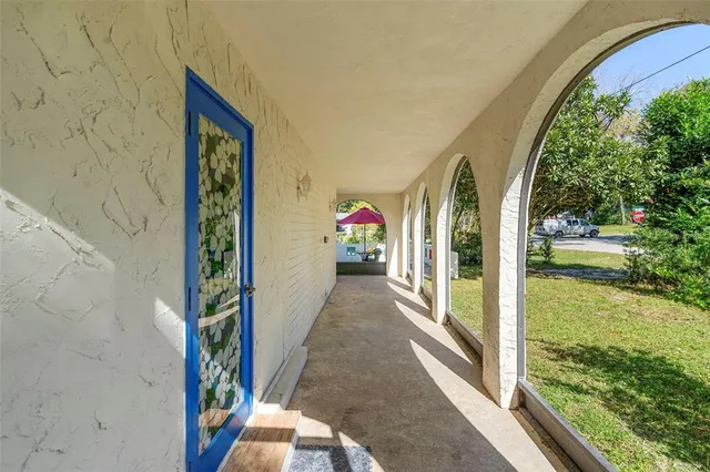 a view of a swimming pool with a lounge chairs