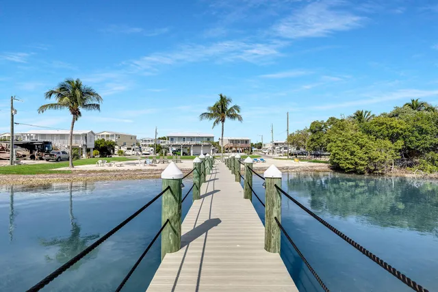 a view of a swimming pool with a chairs