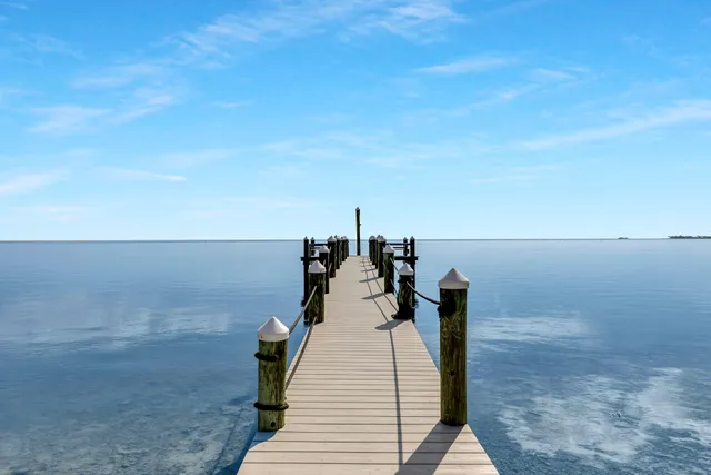 a view of swimming pool with a lounge chair