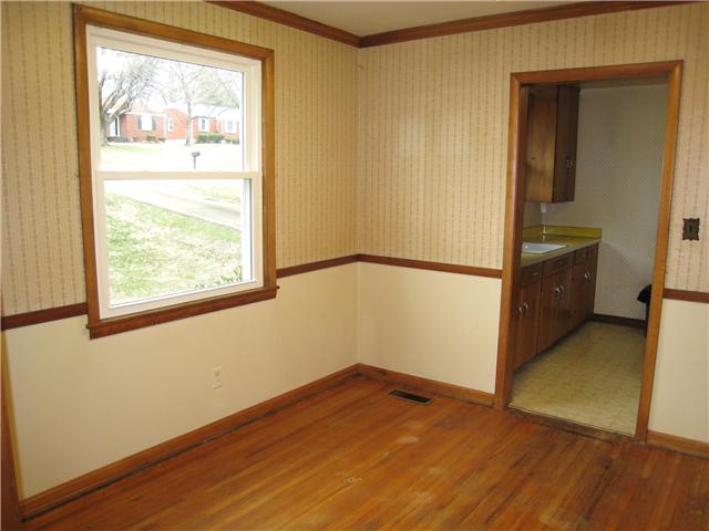 923 Mitchell Road Nashville, TN 37206 - Photo 4 of 20 Formal Dining Room with Hardwood Floors and Chair Rail.