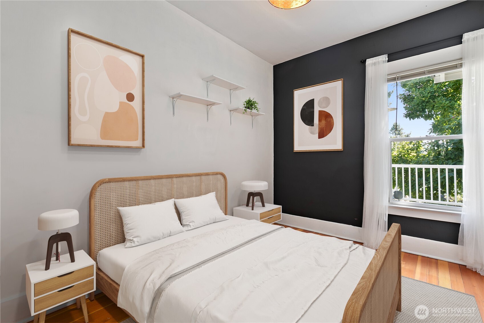 6540 19th Avenue Northeast Seattle, WA 98115 - Photo 14 of 40 a bedroom with a bed and a large window