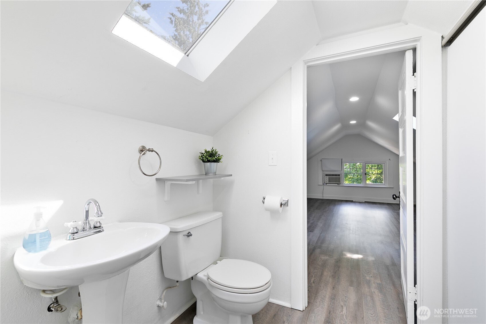 6540 19th Avenue Northeast Seattle, WA 98115 - Photo 16 of 40 a bathroom with a sink toilet and shower