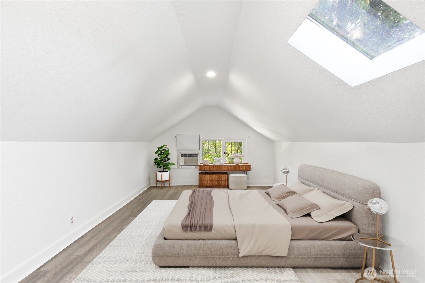 6540 19th Avenue Northeast Seattle, WA 98115 - Photo 18 of 40 a bed room with a bed and a large window