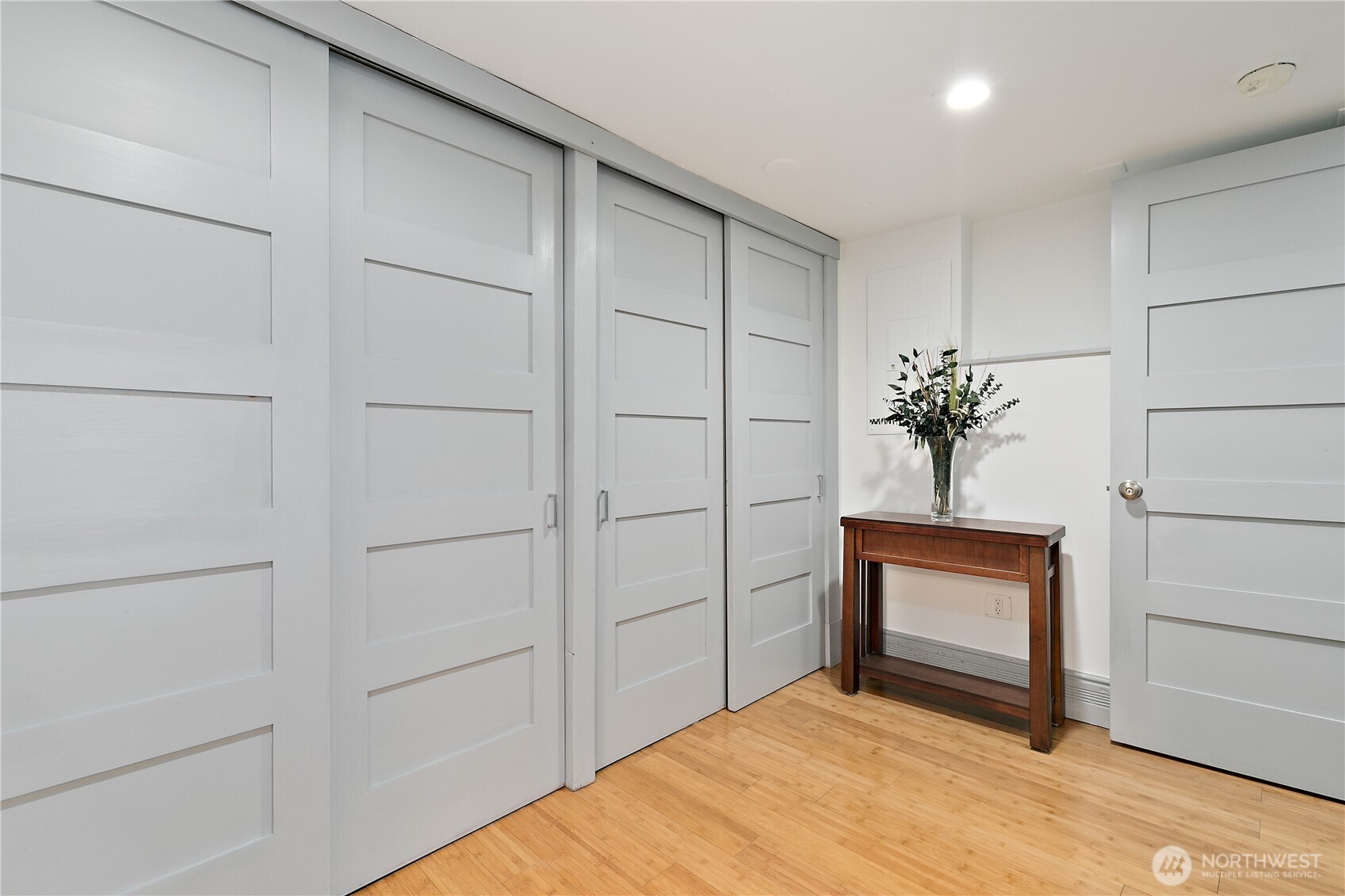 6540 19th Avenue Northeast Seattle, WA 98115 - Photo 24 of 40 a bedroom with a bed and a fireplace