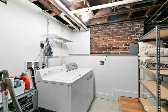 a utility room with dryer and washer
