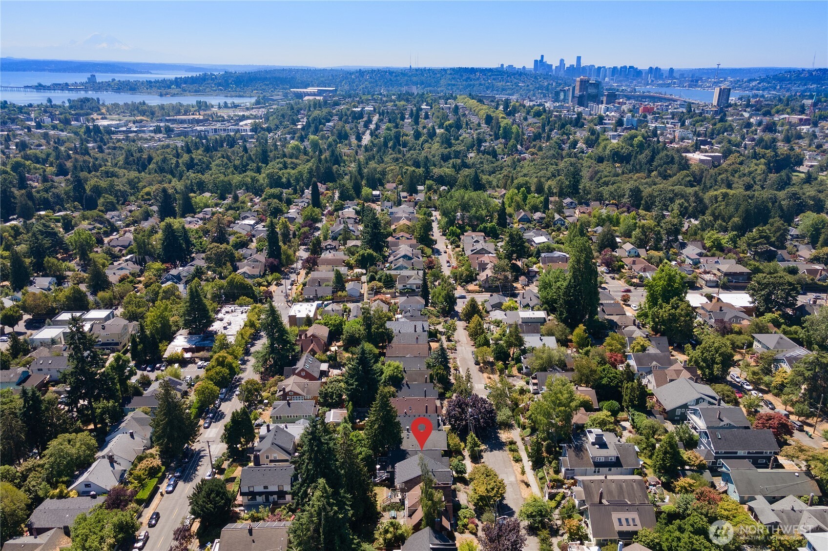 6540 19th Avenue Northeast Seattle, WA 98115 - Photo 40 of 40 an aerial view of residential houses with outdoor space and trees