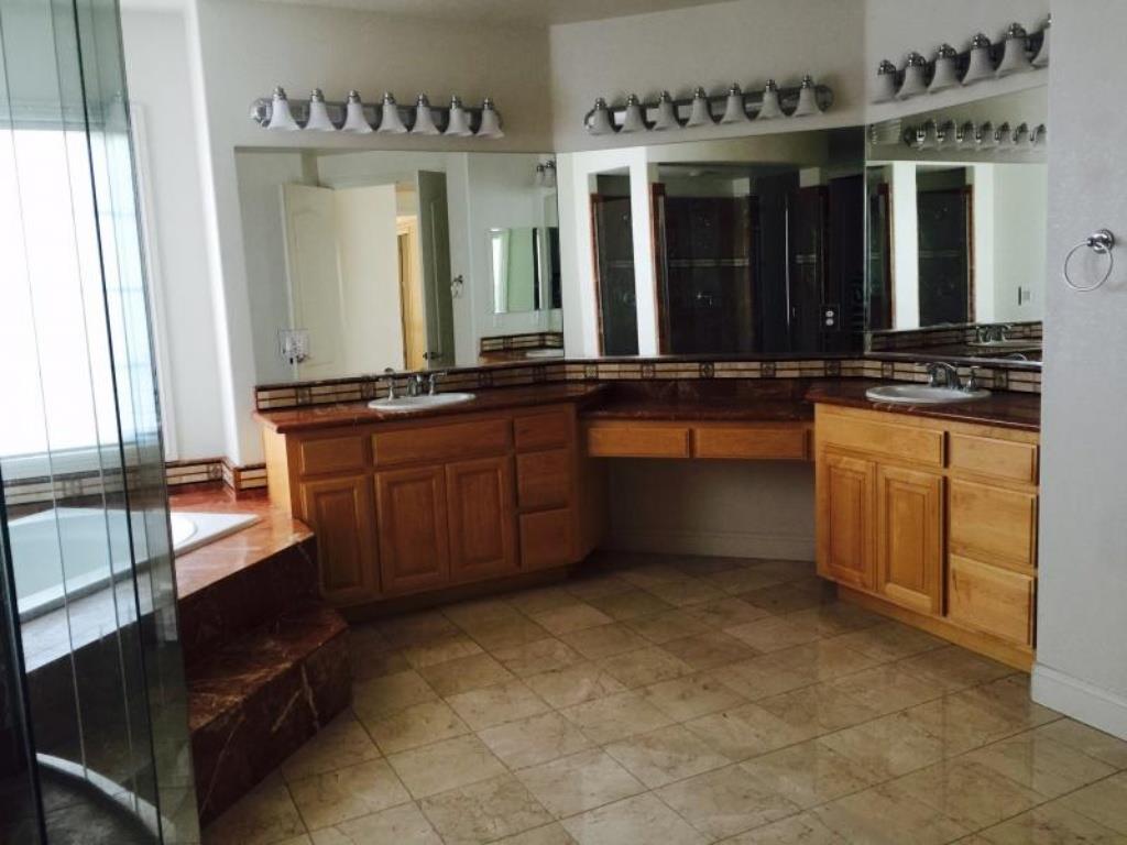 309 Carrick Circle Hayward, CA 94542 - Photo 8 of 12 a large bathroom with a sink and a large mirror