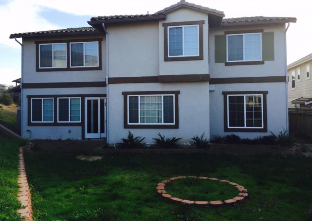 309 Carrick Circle Hayward, CA 94542 - Photo 9 of 12 a backyard of a house with lots of green space