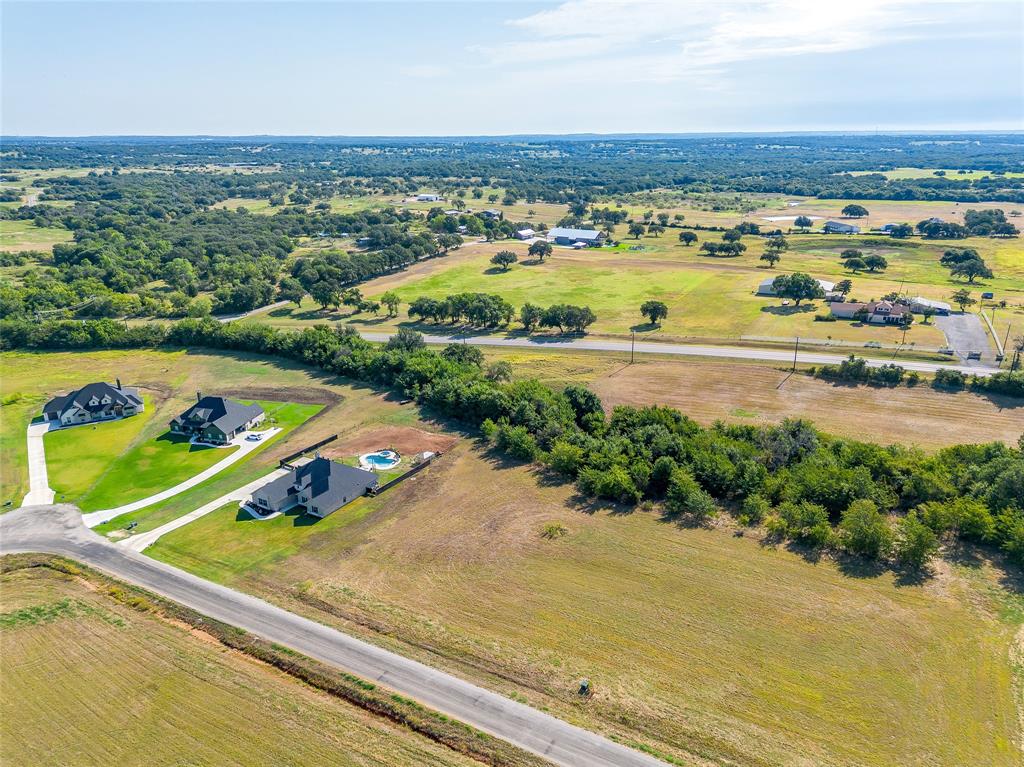 2016 Carrie Court Weatherford, TX 76088 - Photo 2 of 13 an aerial view of a city