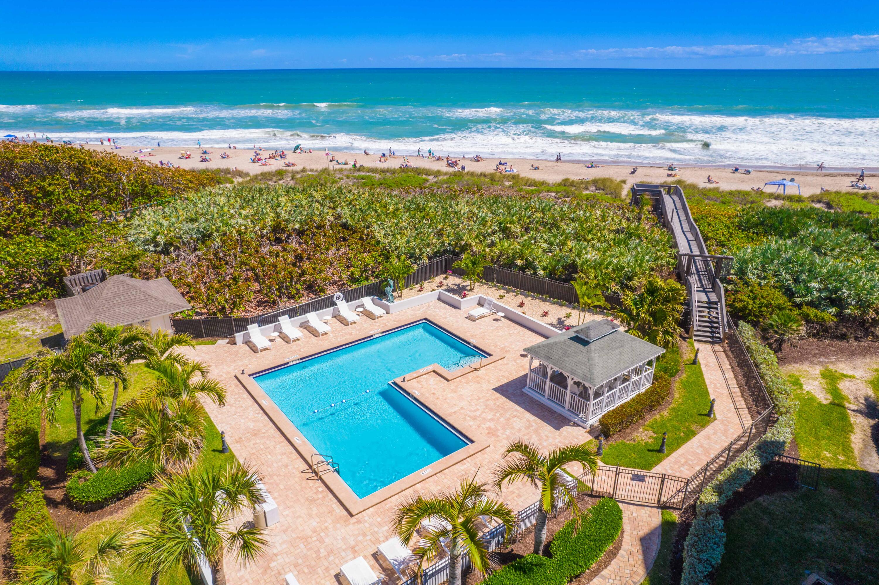 669 Northeast Plantation Road, Unit 308 Stuart, FL 34996 - Photo 7 of 43 Ocean Terrace pool and beach
