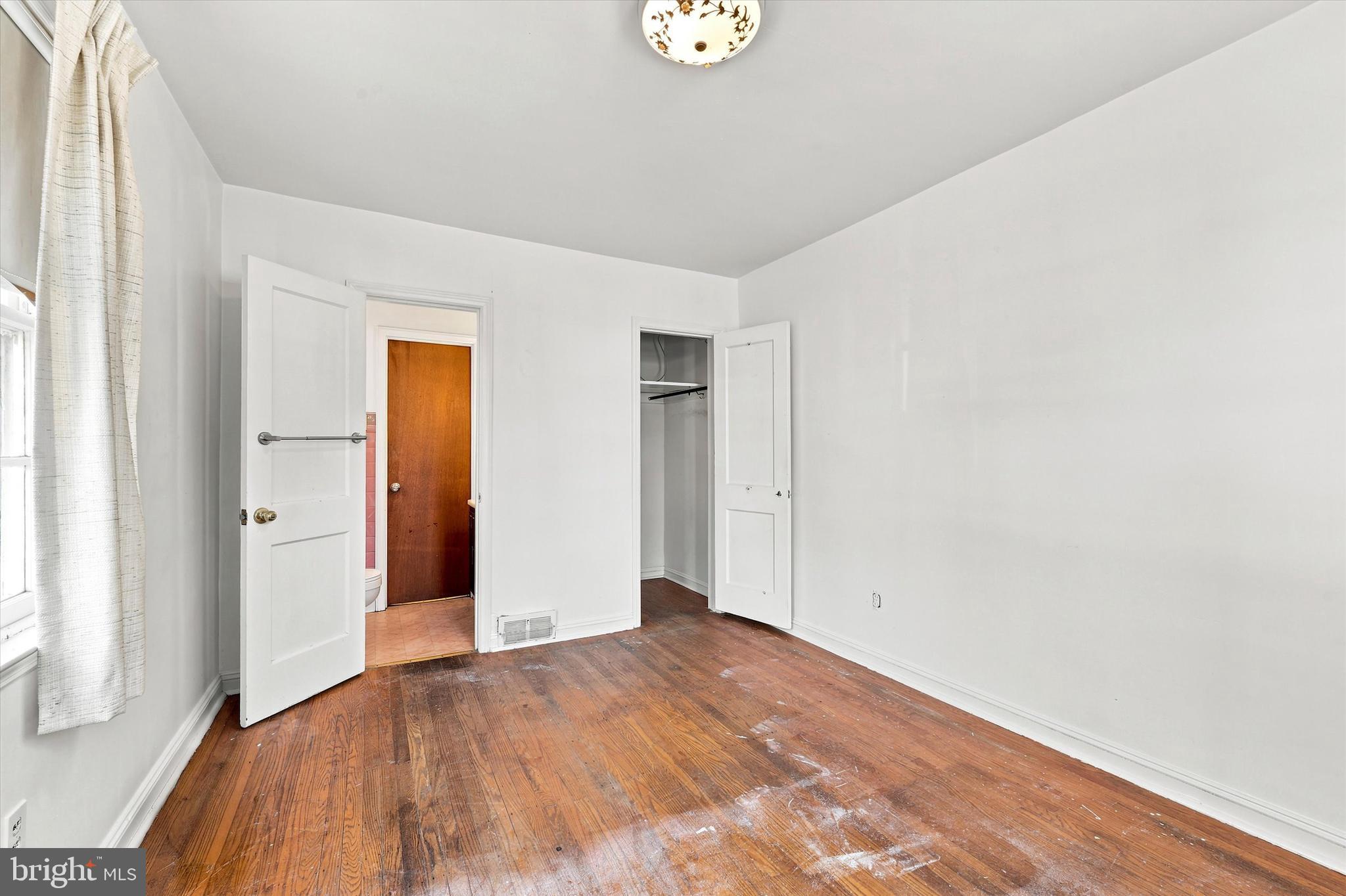 407 Buse Street Ridley Park, PA 19078 - Photo 11 of 26 Bedroom 1 showing powder room entrance