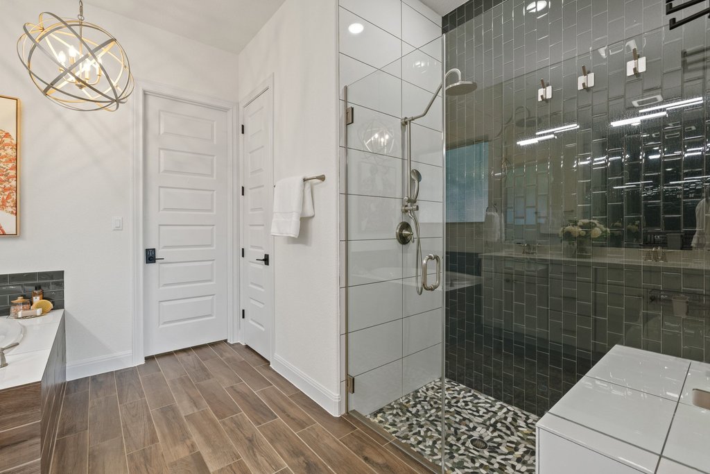17641 Stratus Cove Dripping Springs, TX 78620 - Photo 22 of 40 a bathroom with a shower