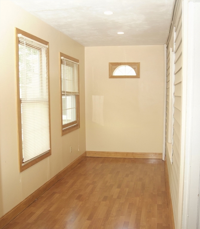 25 Baltimore Street, Unit 2/3 Lynn, MA 01902 - Photo 12 of 36 a view of an empty room with a window
