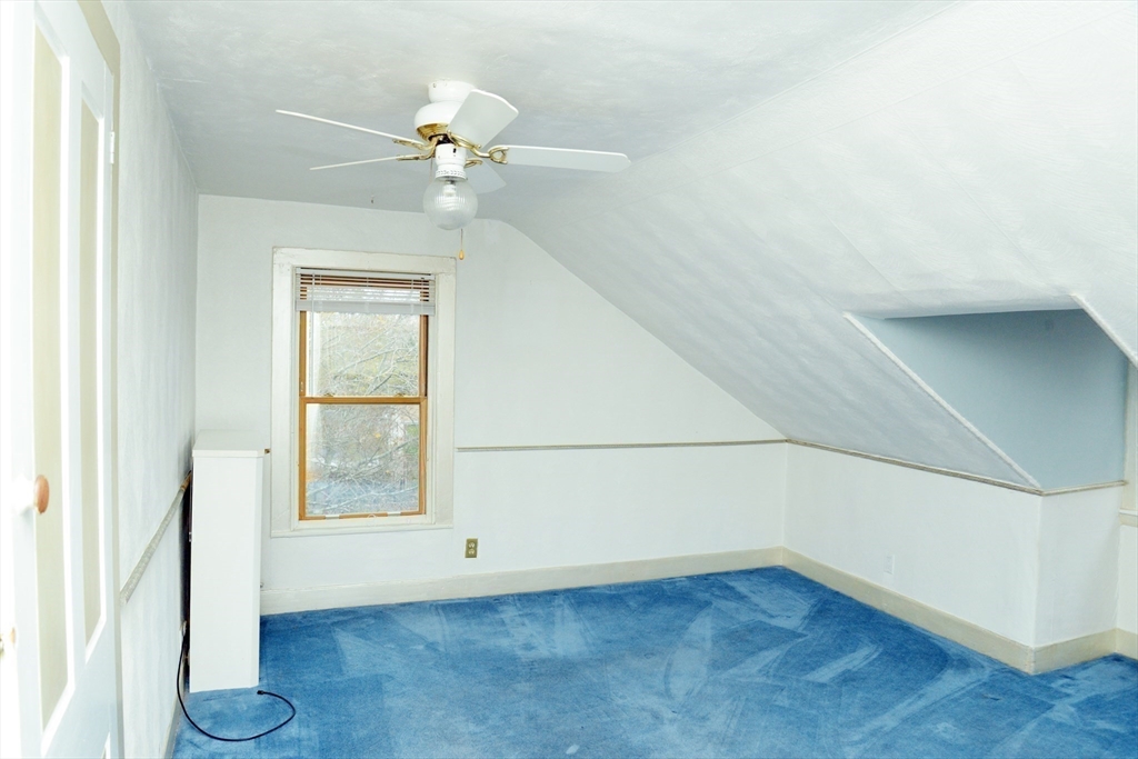 25 Baltimore Street, Unit 2/3 Lynn, MA 01902 - Photo 24 of 36 an empty room with a window