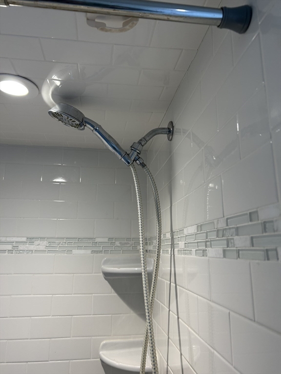 25 Baltimore Street, Unit 2/3 Lynn, MA 01902 - Photo 29 of 36 a bathroom with a shower