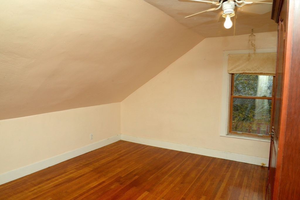 25 Baltimore Street, Unit 2/3 Lynn, MA 01902 - Photo 30 of 36 a view of empty room with wooden floor