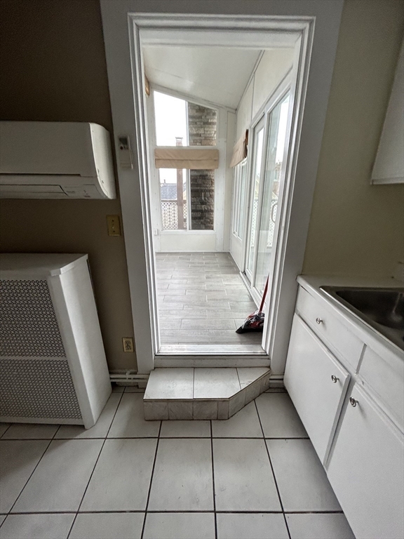 25 Baltimore Street, Unit 2/3 Lynn, MA 01902 - Photo 31 of 36 a view of a door and utility room