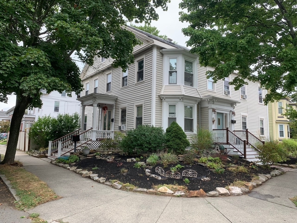 25 Baltimore Street, Unit 2/3 Lynn, MA 01902 - Photo 36 of 36 a front view of a house with garden