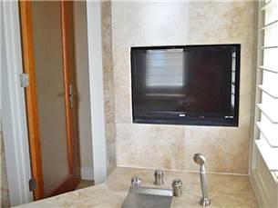 58 Sunfish Street Destin, FL 32541 - Photo 13 of 32 a bathroom with a shower and a sink