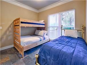 58 Sunfish Street Destin, FL 32541 - Photo 16 of 32 a bedroom with two beds and a window