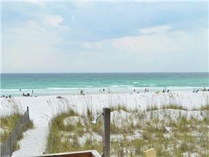58 Sunfish Street Destin, FL 32541 - Photo 32 of 32 a view of a lake with a mountain in the background
