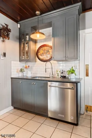 a bathroom with a bathtub and a sink