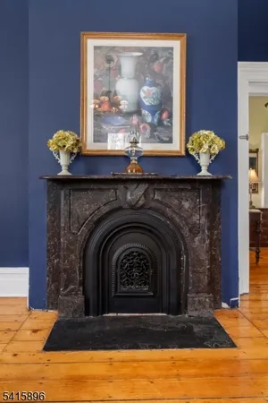 a bedroom with a bed window and couch
