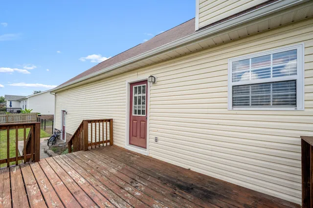 a view of a house with a deck