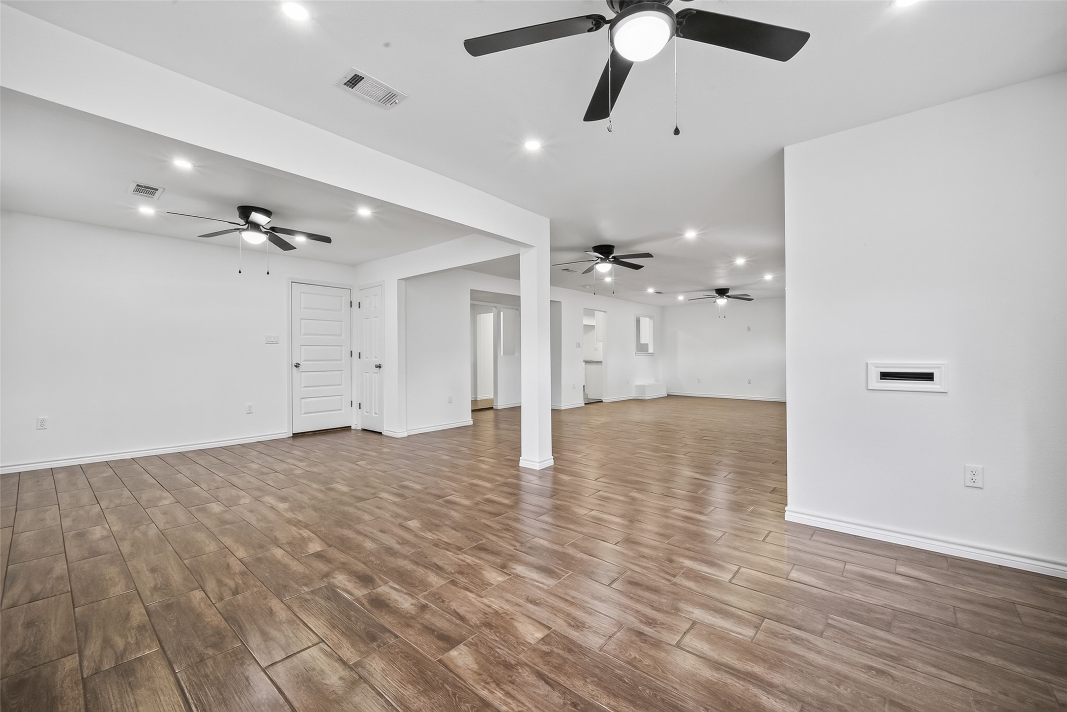 3530 Rosedale Street Houston, TX 77004 - Photo 9 of 50 Spacious living area ideal for sleek or larger furnishings.