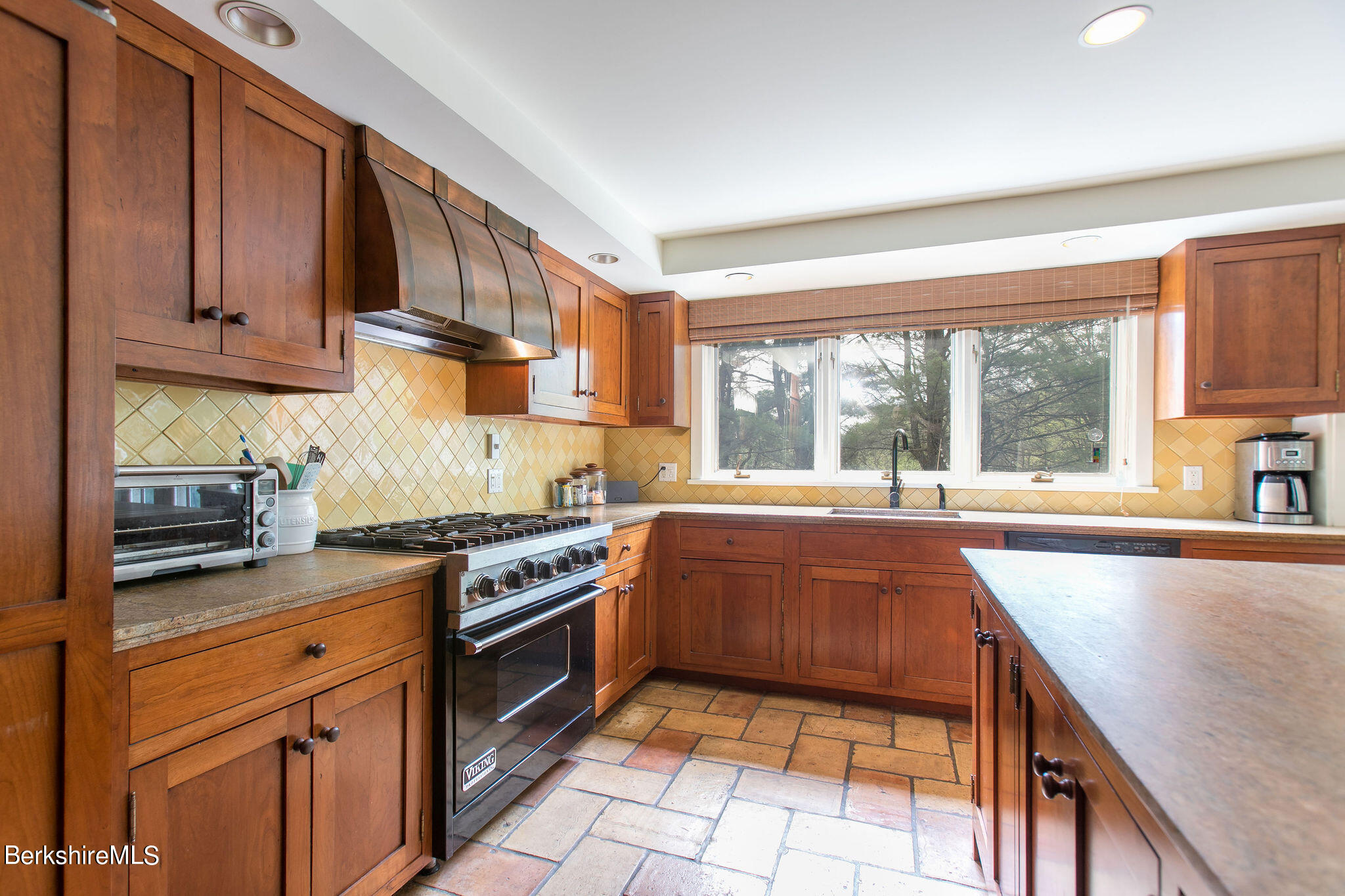 15 W Road Alford, MA 01266 - Photo 14 of 64 a kitchen with stainless steel appliances granite countertop a stove a sink and a microwave