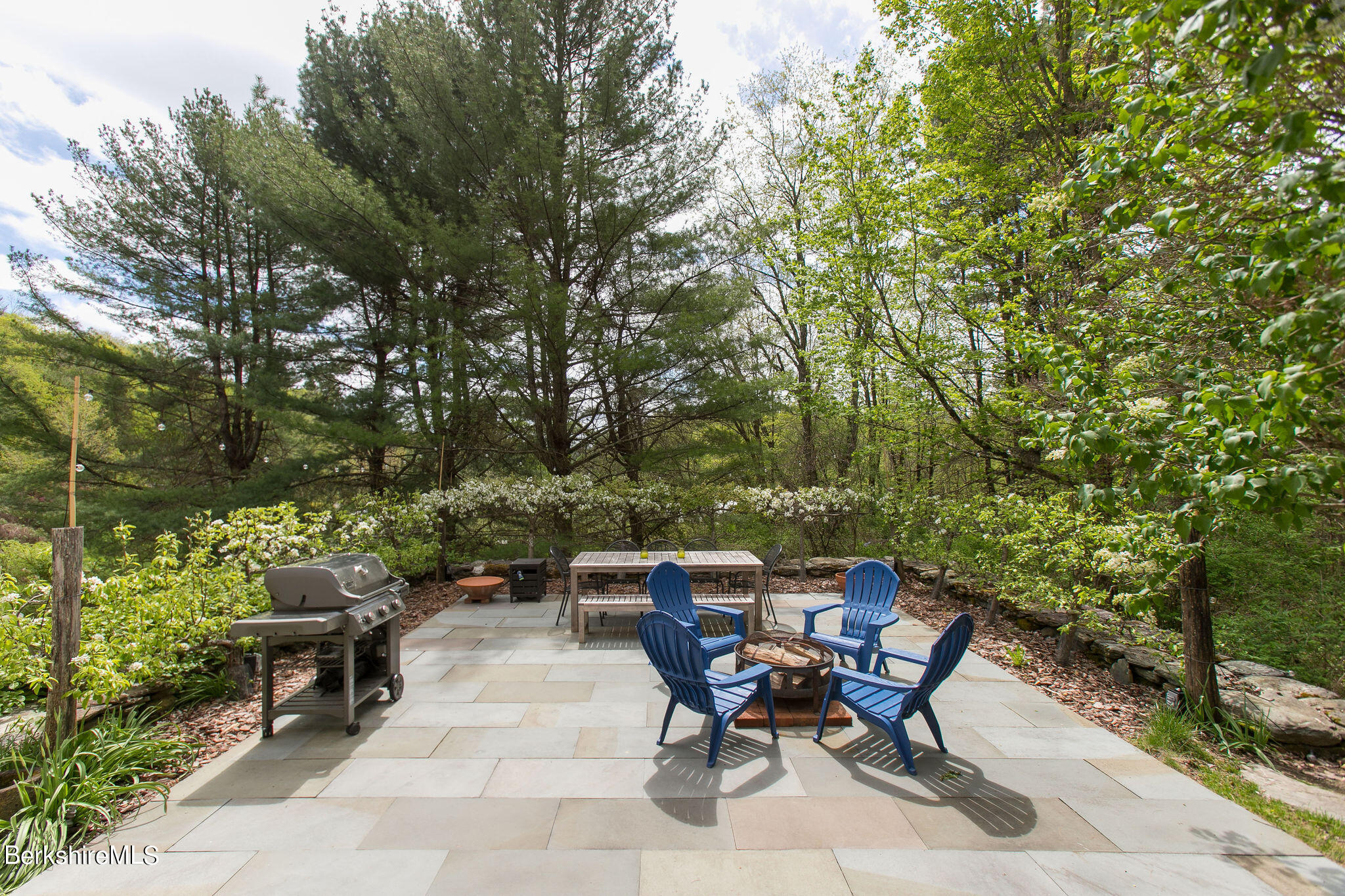 15 W Road Alford, MA 01266 - Photo 17 of 64 a view of a backyard with sitting area