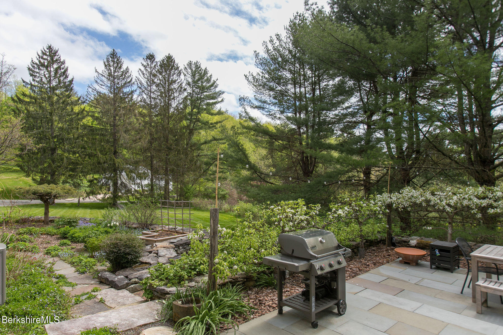 15 W Road Alford, MA 01266 - Photo 19 of 64 a view of a bench in a garden