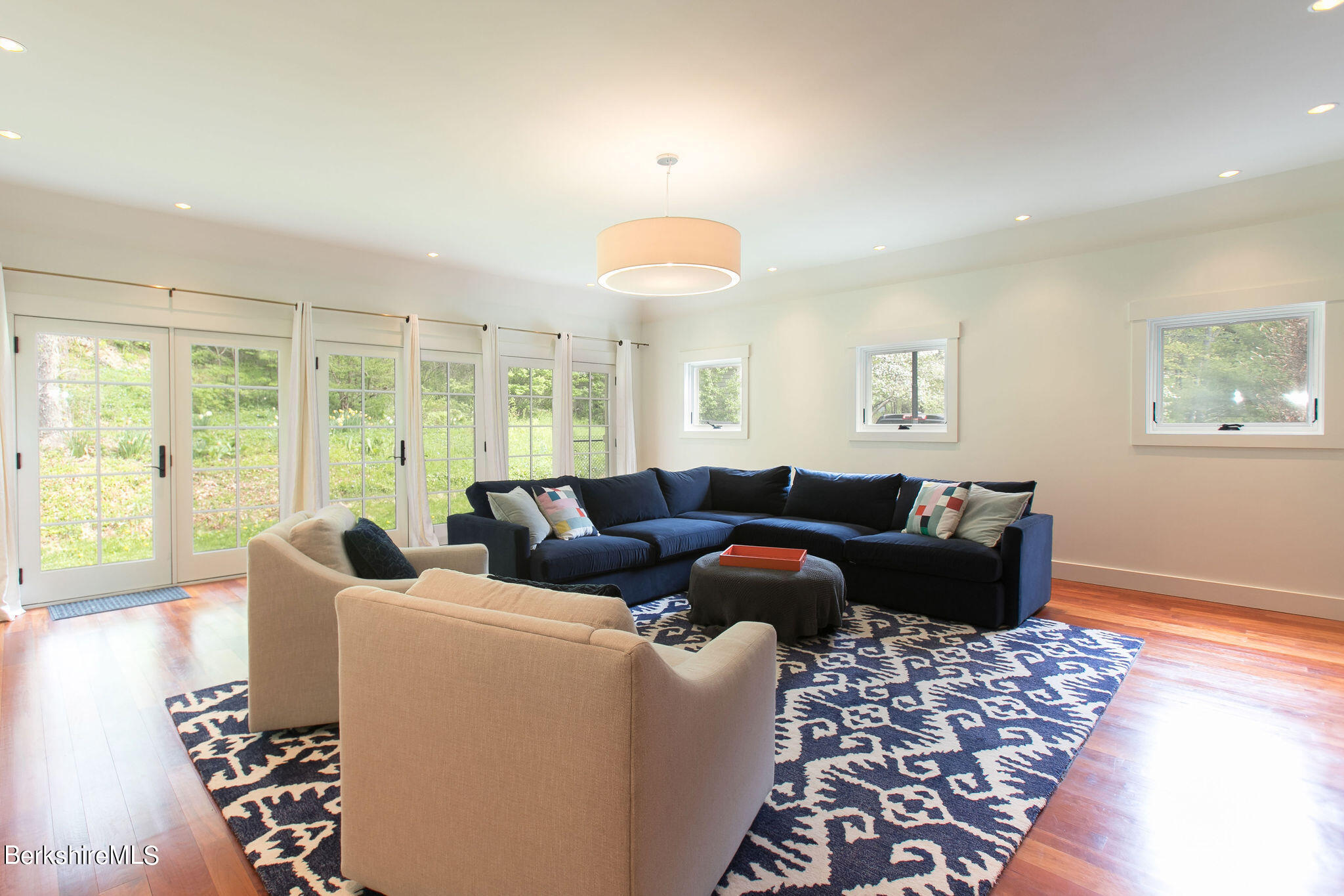15 W Road Alford, MA 01266 - Photo 26 of 64 a living room with furniture lamp and a large window