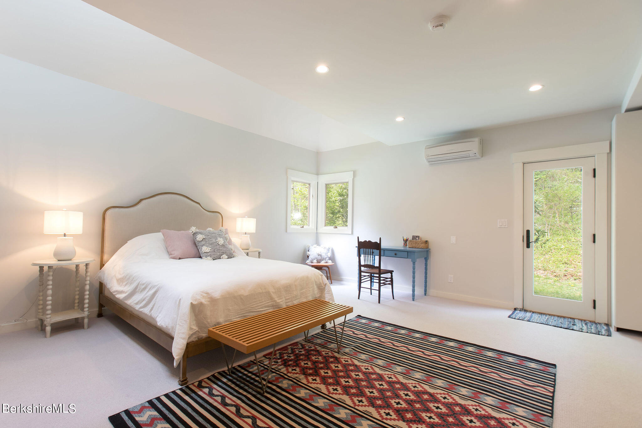 15 W Road Alford, MA 01266 - Photo 28 of 64 a bedroom with a bed a table and chair