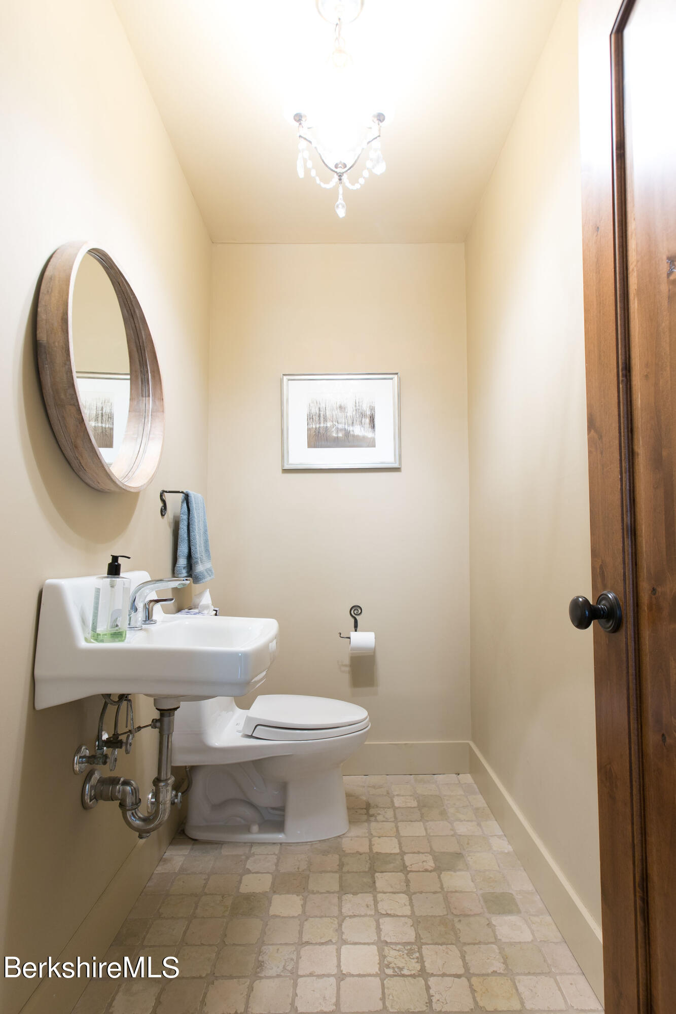 15 W Road Alford, MA 01266 - Photo 30 of 64 a bathroom with a toilet a sink and a mirror