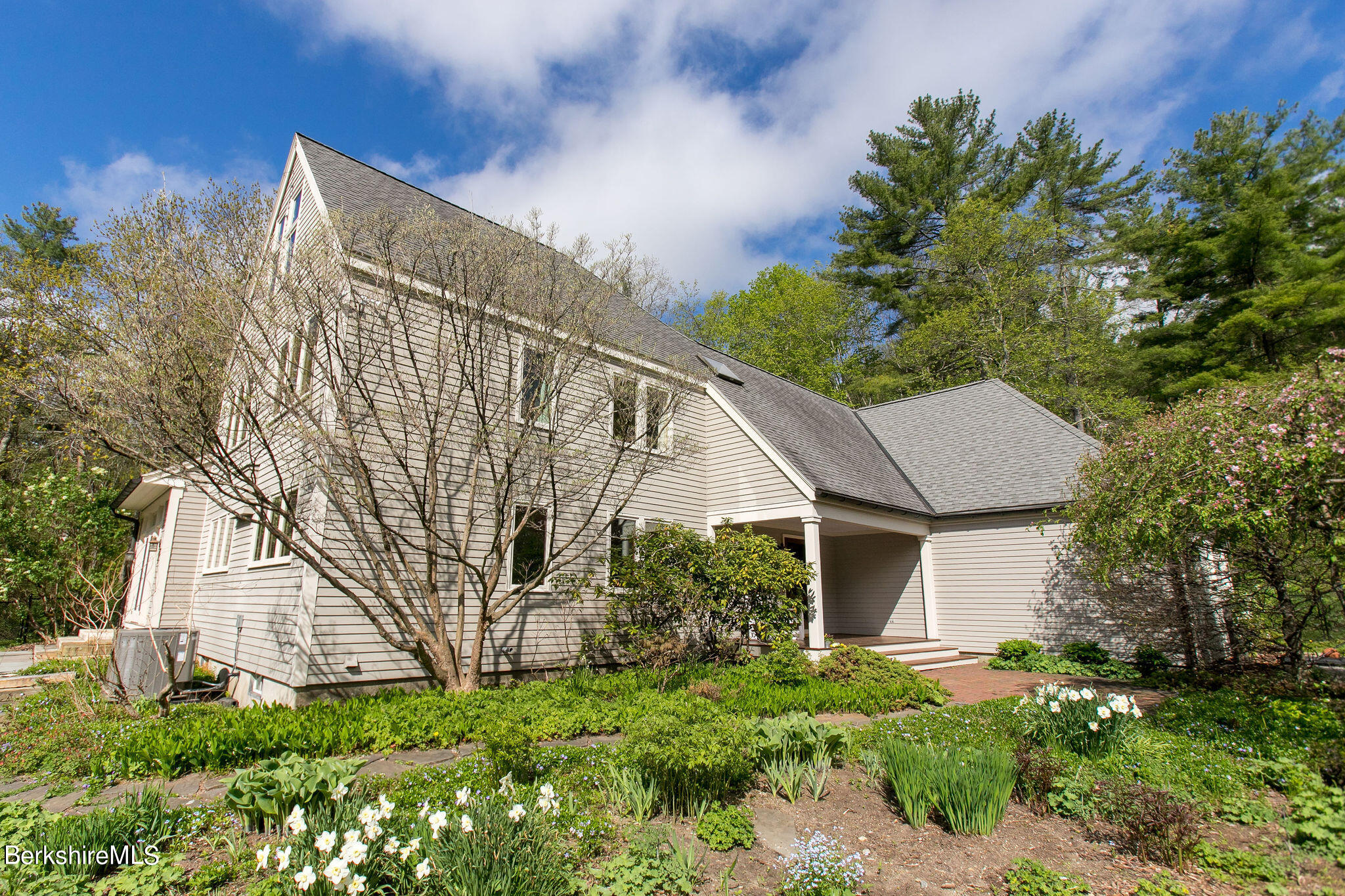 15 W Road Alford, MA 01266 - Photo 5 of 64 a view of a house with a yard and plants