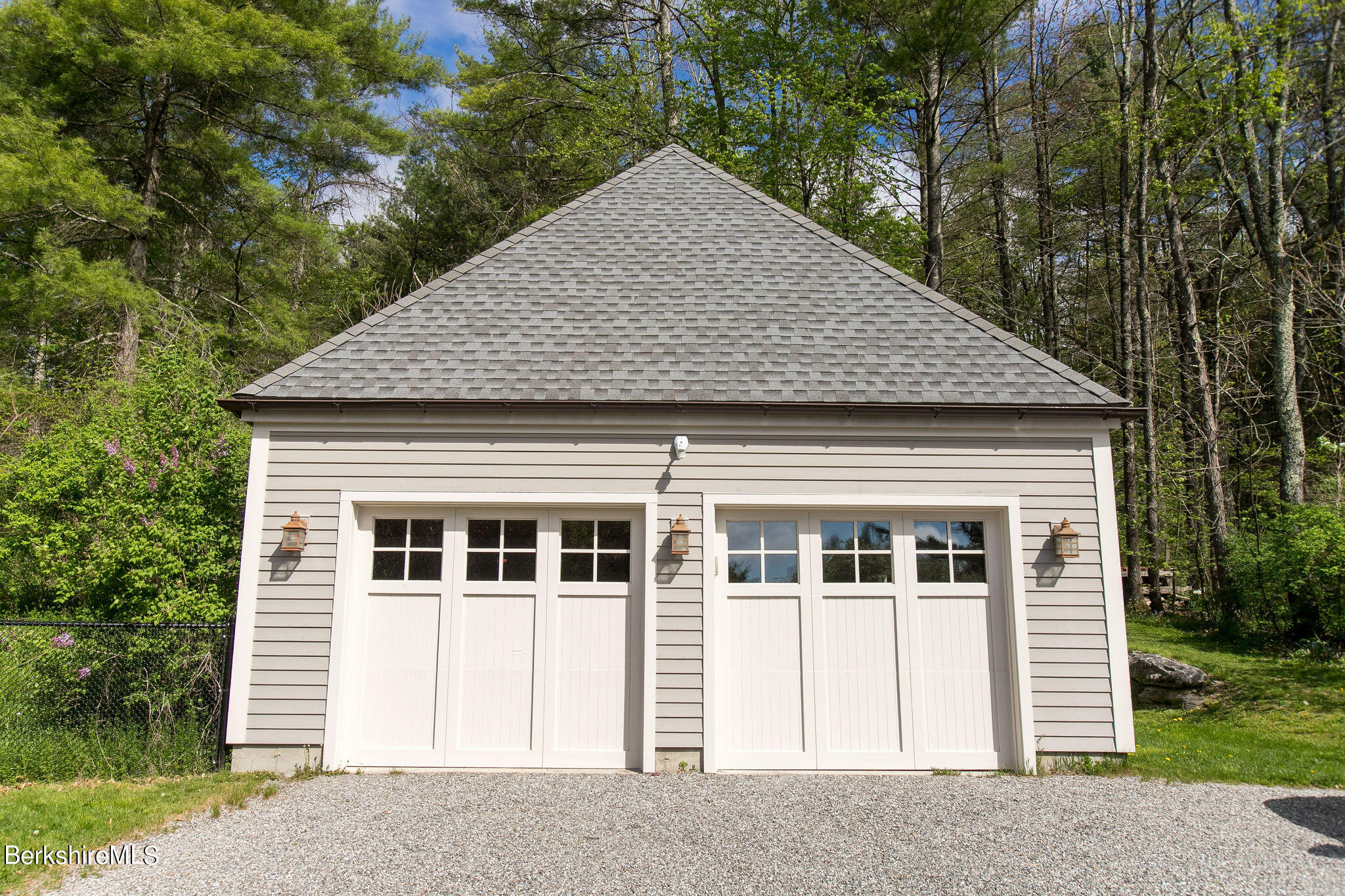 15 W Road Alford, MA 01266 - Photo 52 of 64 a front view of a house with a garden