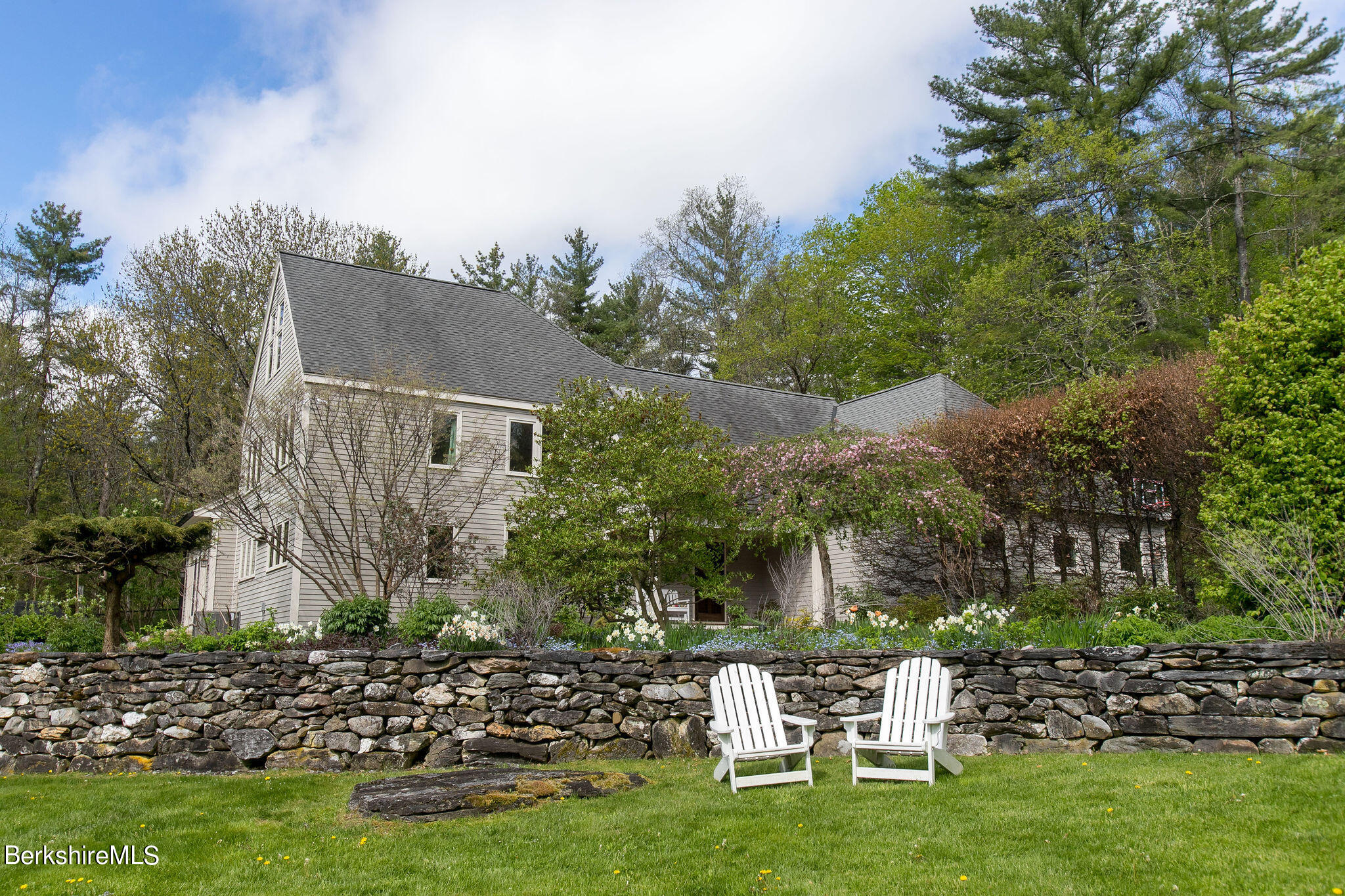 15 W Road Alford, MA 01266 - Photo 61 of 64 a view of a chair and tables in the garden