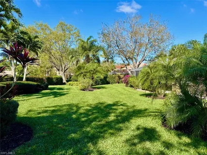 a view of backyard with green space