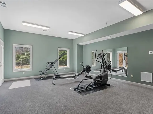a view of a room with gym equipment