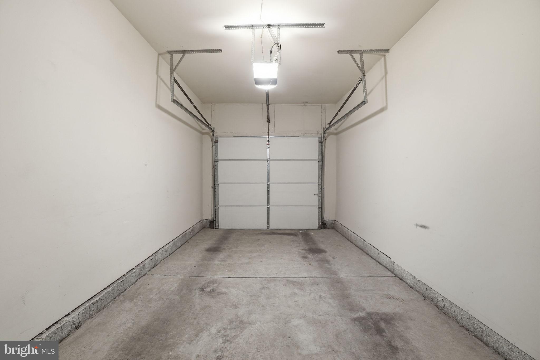7871 Rolling Woods Court, Unit 1104 Springfield, VA 22152 - Photo 30 of 38 a view of a garage