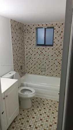 a bathroom with a toilet