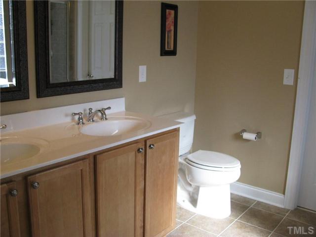 13019 Saxon Way Raleigh, NC 27613 - Photo 9 of 12 Master bath. with raised double vanity and very large walk in closet.