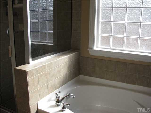 13019 Saxon Way Raleigh, NC 27613 - Photo 10 of 12 Garden tub and separate shower in master bath.